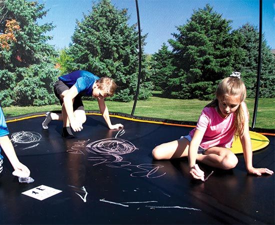 kids playing on trampoline